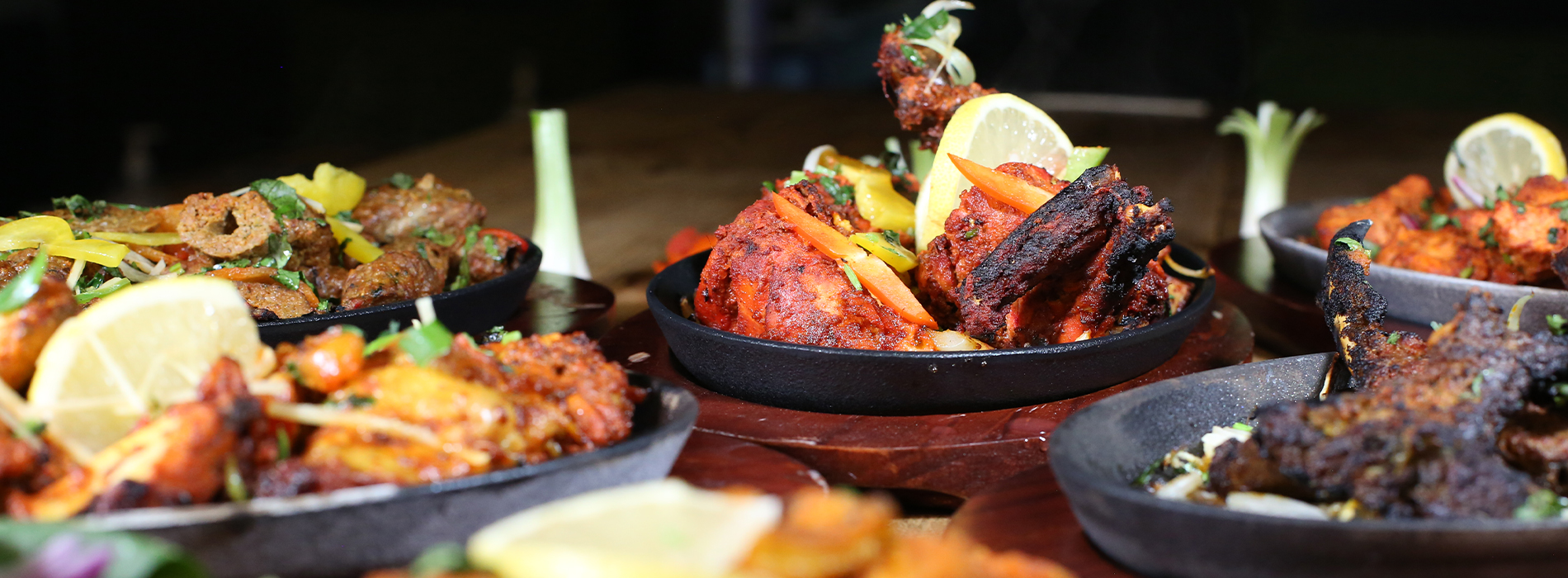 Tandoori chicken on a sizzling plate